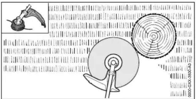 Technical diagram showing mechanical components and a circular target with measurement scale, including a magnified inset of a device.
