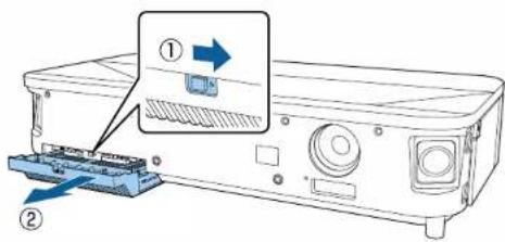 Diagram showing a device with labeled parts and an arrow indicating a process step, likely illustrating a file or assembly process.