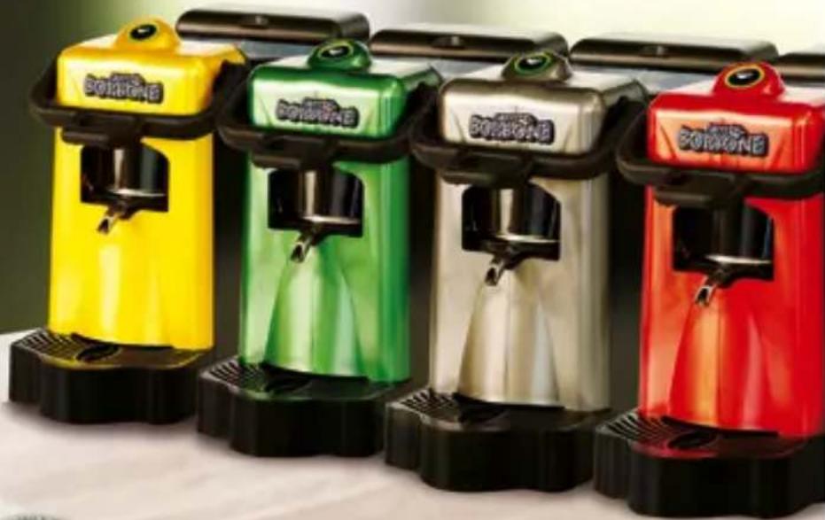 Five colorful beverage cans with black bases, yellow, green, silver, and red colors (no visible text or symbols)