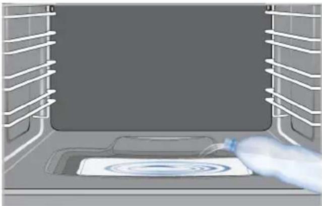 BEKO FSM59305WDT - Čištění nádrže s vodou na dně trouby - 1
