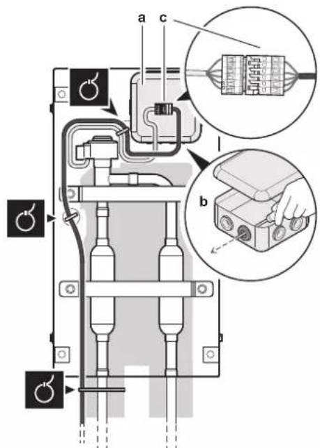 Technical diagram of a mechanical or electrical component with labeled parts and close-up insets showing internal components and connections.