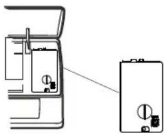 Technical line drawing of a mechanical device with internal components and a separate view showing a cylindrical component (no text or symbols)