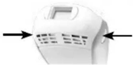 Close-up of a white electronic device with ventilation slots and a screen (no visible text or symbols)