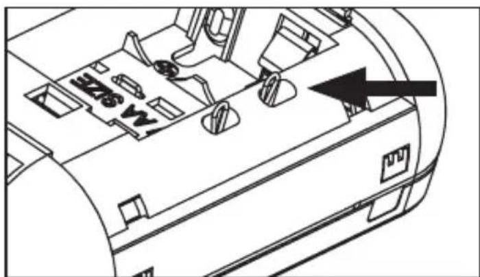 Technical diagram of a vehicle interior with labeled components and an arrow indicating direction or flow.