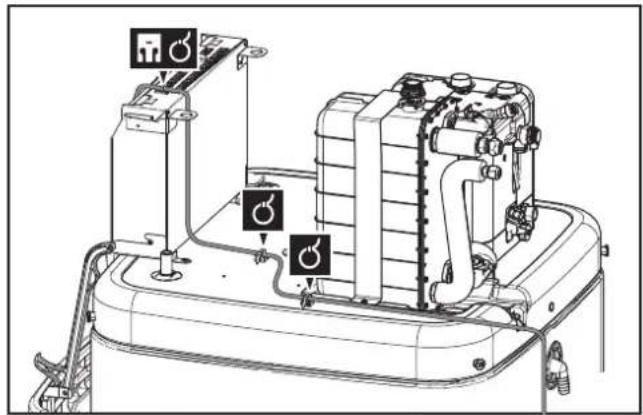 Technical diagram of a steam turbine or generator with labeled components and warning symbols