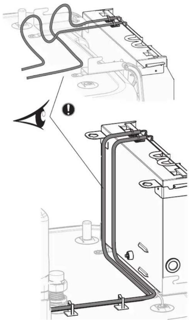 Technical diagram showing engine components with labeled parts and a warning symbol pointing to a key.