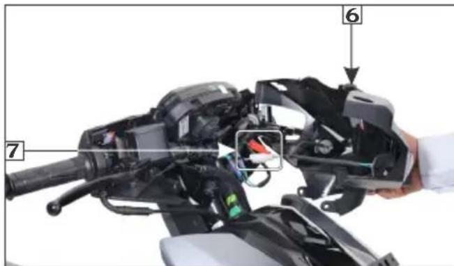 Labeled diagram of a robotic device with numbered parts, showing hand and component assembly