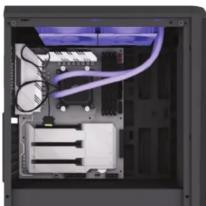 Interior view of a computer drive bay showing internal components like CPU, memory, and ventilation pipes (no text or labels visible)