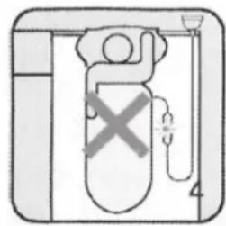 Diagram of a medical or laboratory setup with labeled components and a cross symbol indicating a specific area.