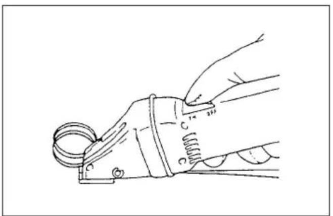 Line drawing of a hand using a tool to press or adjust a mechanical component (no text or symbols present)