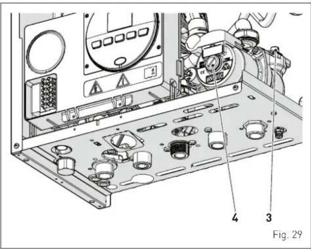 Technical diagram of an electronic device with labeled components, showing internal wiring and mounting areas.