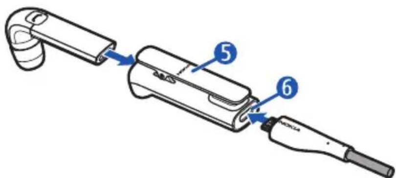 Diagram of a handheld device with labeled parts, showing internal components and directional arrows.