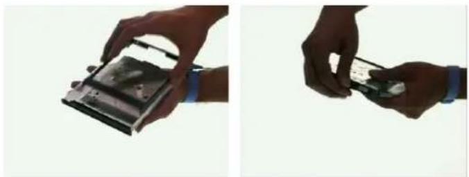 Two hands holding a device, one open and one inserted (no visible text or symbols)