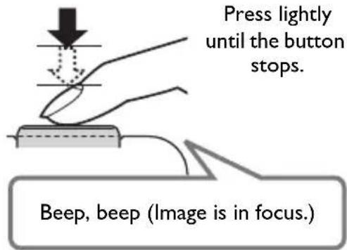 Press lightly until the button stops. Beep, beep (Image is in focus.)