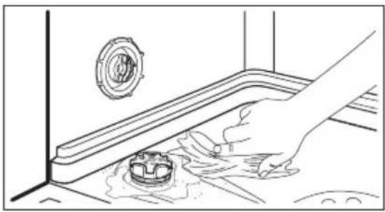 Line drawing of a hand cleaning a floor drain with a circular component and pipe (no text or symbols)