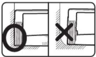Technical drawing showing a circular hole and a cross symbol with an 'X' mark, likely indicating a mechanical or engineering feature.