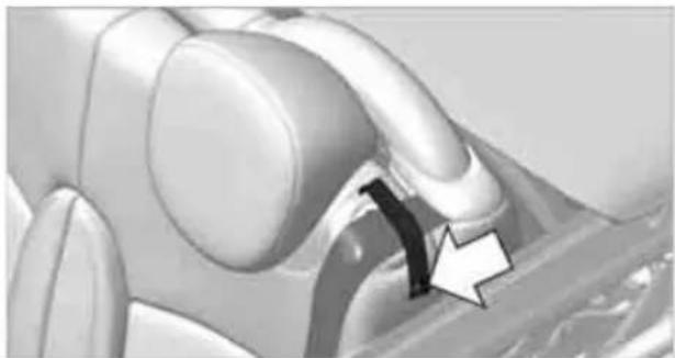 Close-up of a mechanical component with curved surfaces and a black arrow indicating a specific feature (no text or symbols present)