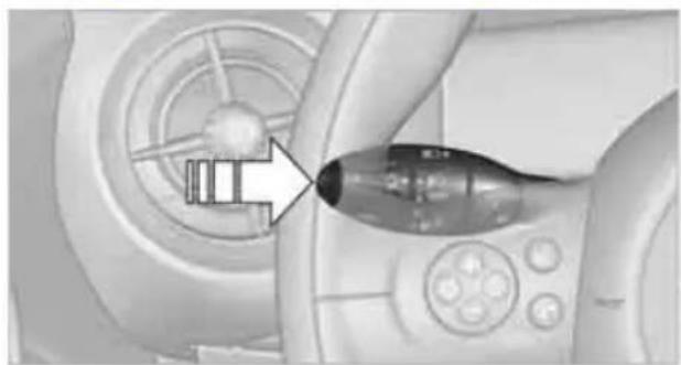 Close-up of a medical device with a metallic tool inserted into a circular component (no visible text or symbols)