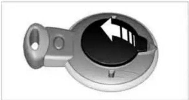 Close-up of a mechanical component with a circular dial and arrow indicator (no text or symbols)