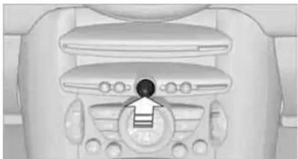 Top-down view of a car dashboard with steering wheel and air vent (no visible text or symbols)