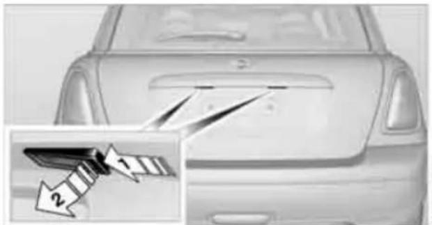 Side view of a car with a triangular blade being cut off, showing two arrows pointing to the blade (no text or symbols present)