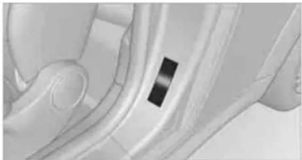 Close-up of a car interior showing the dashboard and steering wheel (no visible text or symbols)