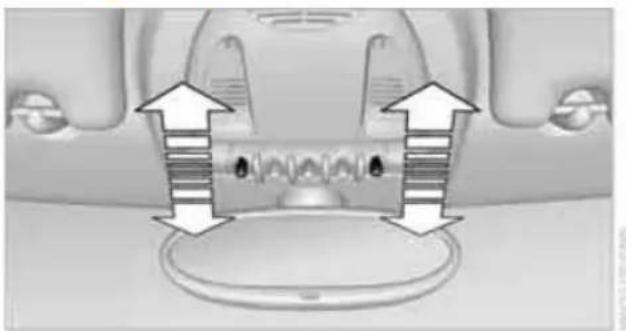 Diagram of a car interior showing directional arrows and internal components (no text or symbols)
