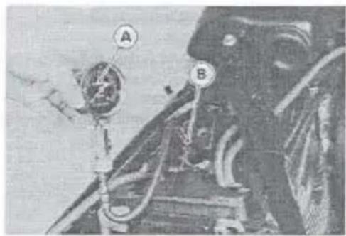 Technical diagram showing labeled components A and B with annotations and wiring, likely from an industrial or mechanical context.