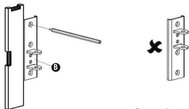 Technical diagram showing a door handle assembly with labeled parts and a close-up view of the handle with cross symbol.