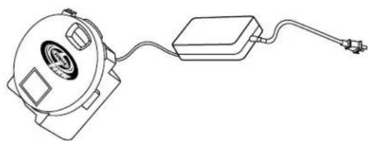 Line drawing of a mechanical device with a circular housing and connected cable (no text or symbols)