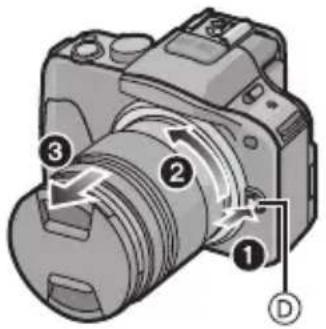 PANASONIC Lumix DMC-G3X - Drej objektivet i pilens retning, mens du trykker på objektivets udløserknap Ⓓ, og tag den af. - 1