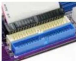Close-up of a computer RAM module with blue and yellow memory chips (no visible text or labels)