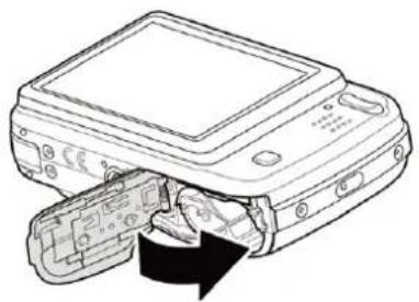 Line drawing of a device with a cable inserted into a slot (no text or symbols)