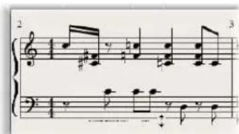 Sheet music excerpt with treble and bass clefs, showing musical notation and dynamic markings