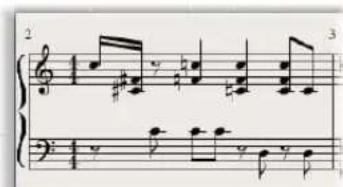 Sheet music excerpt with treble and bass clefs, showing musical notation and dynamic markings