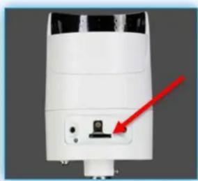 White industrial air purifier with a red arrow pointing to a small component (no text or symbols visible)