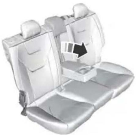 3D rendering of a car backseat with seat covers and a black arrow indicating direction (no text or symbols)