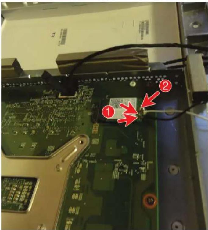 Laptop screen with visible circuit board and labeled components, marked with red arrows indicating connection points.