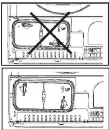 Technical diagram showing two views of a device with a crossed-out X symbol indicating prohibition or exclusion.
