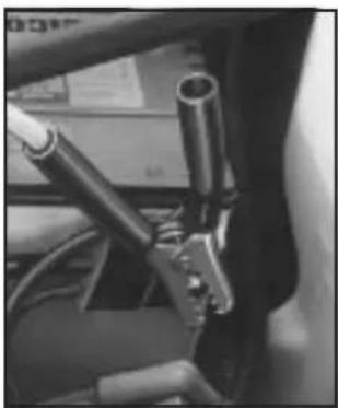 Close-up of a mechanical component with cylindrical and connecting rods (no visible text or symbols)