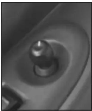 Close-up of a metallic mechanical component with a central cylindrical feature (no visible text or symbols)