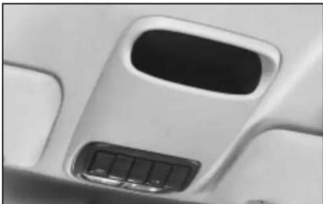 Close-up of a white airplane seat cover with a black vent and control panel (no text or symbols visible)