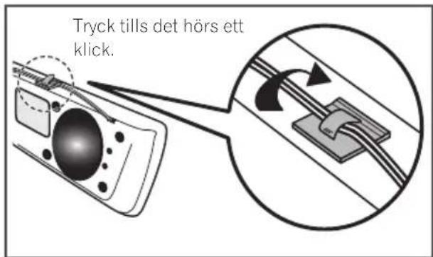 Tryck tills det hörs ett klick.
