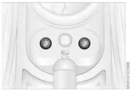 Illustration of a medical device with two eyes and a tube, no visible text or symbols