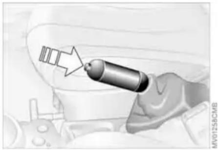 Illustration of a mechanical component with an arrow pointing to a cylindrical part (no text or symbols)