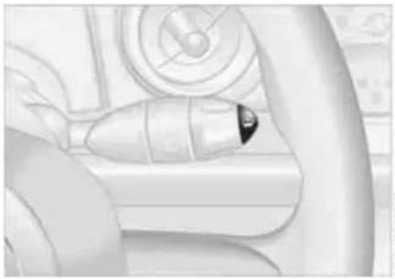 Close-up of a hand holding a small object, possibly a device or tool, with no visible text or symbols.