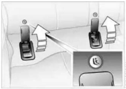 Diagram showing car seatbelt insertion with upward arrows and a circular logo, likely illustrating vehicle safety or repair instructions.
