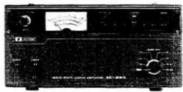 Front panel of an analog multimeter with visible measurement scale and control knobs