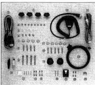 Labeled photo of a mechanical assembly with numbered parts and accessories