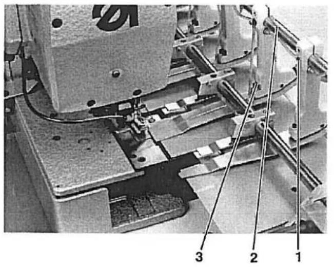 Technical diagram of a machine tool with numbered components labeled 1, 2, and 3